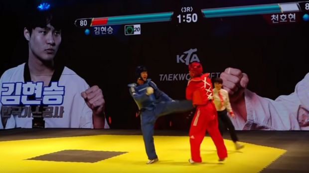 taekwondo-match-turns-into-irl-tekken-with-health-bar-and-sound-effects